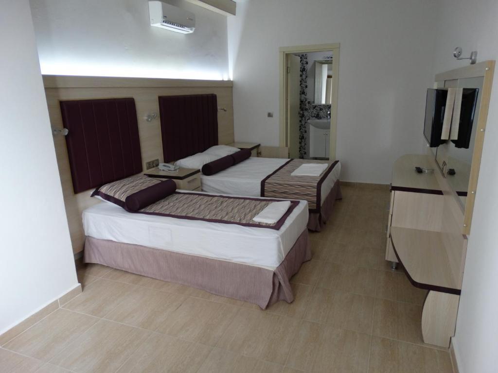 Bronze Hotel Gümbet Quarto foto